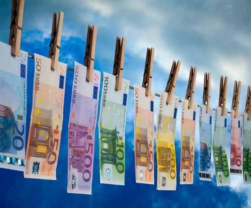 Counterfeit money drying outside on a clothes line